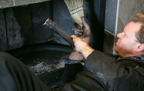 Chimney Sweep cleaning  fireplace inside of home